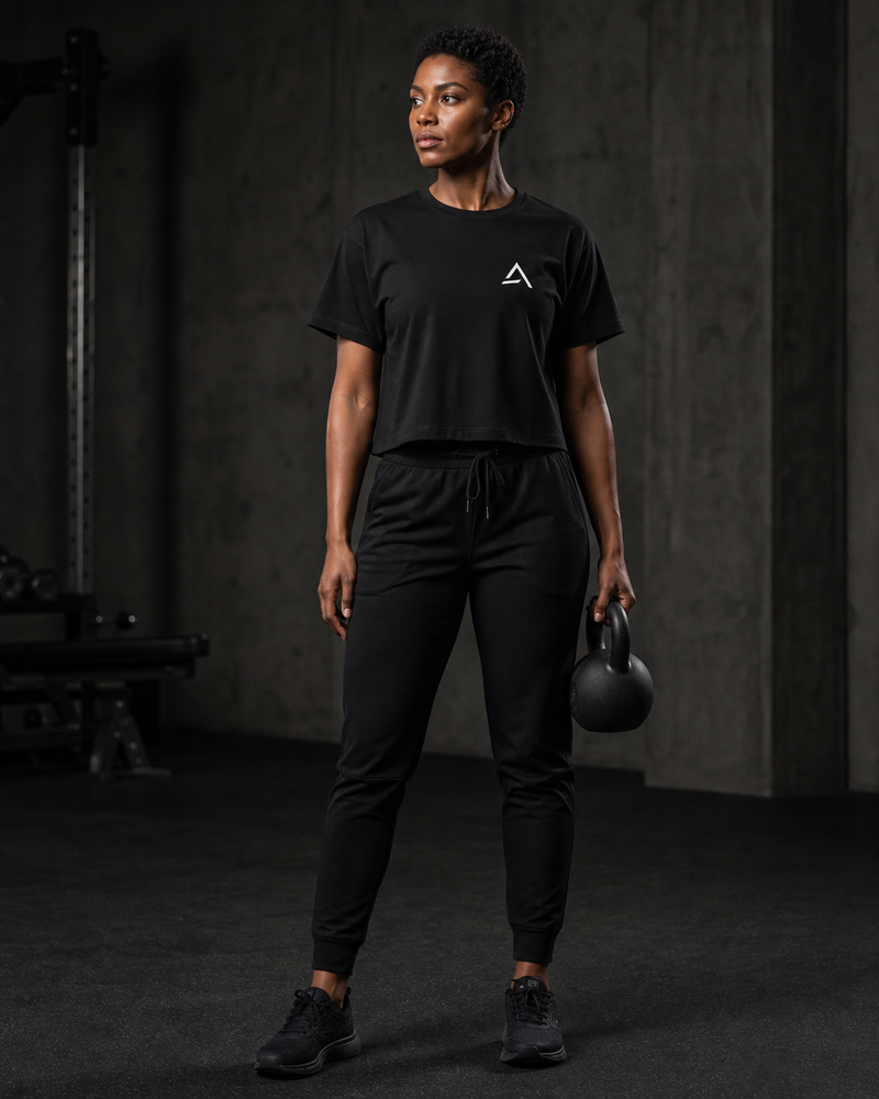 Woman modeling the black Self Made Club Form Box Tee