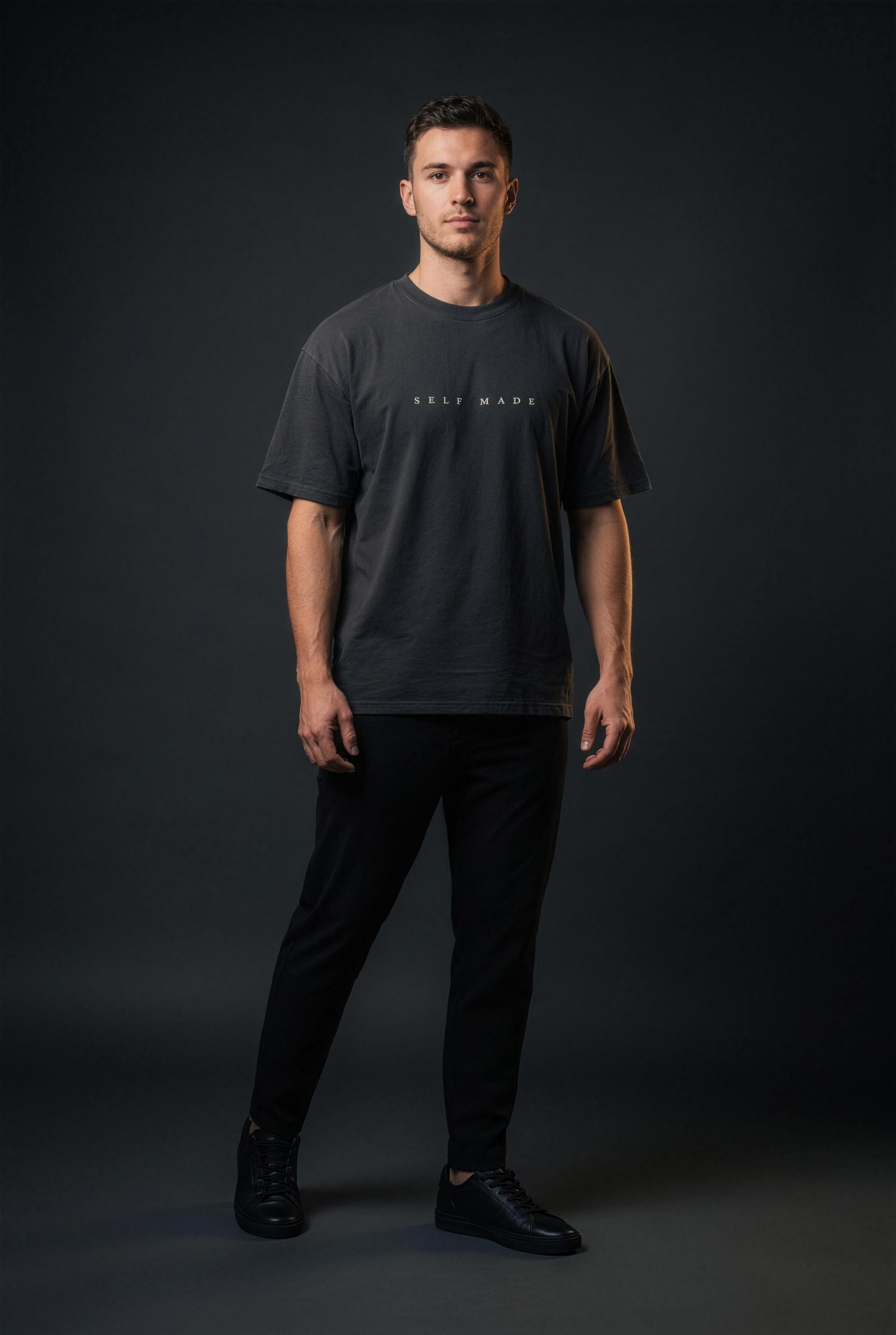 Male model wearing the Self Made Club Forged in Repetition Tee - front