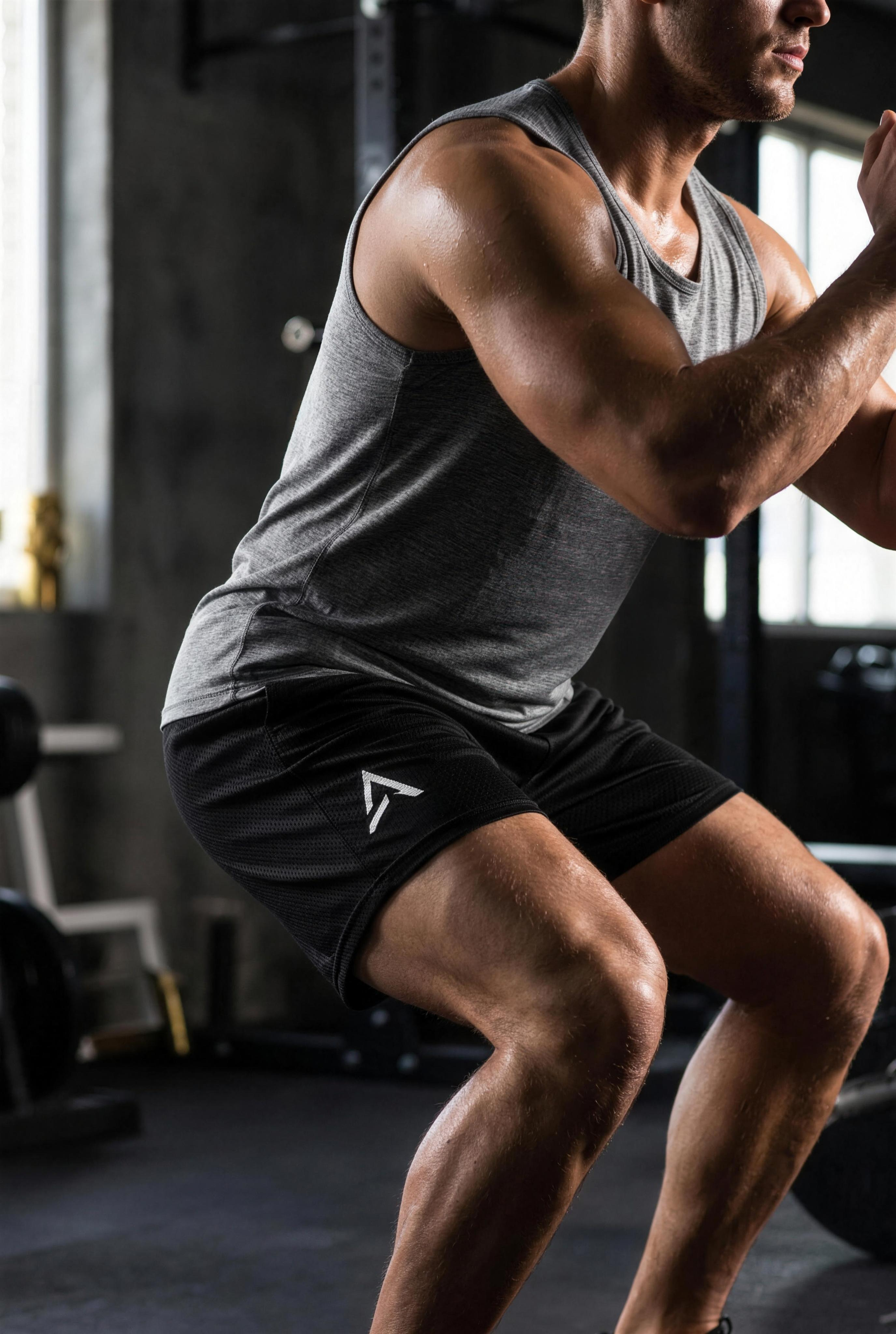 Male model wearing the Self Made Club Mesh Performance Shorts