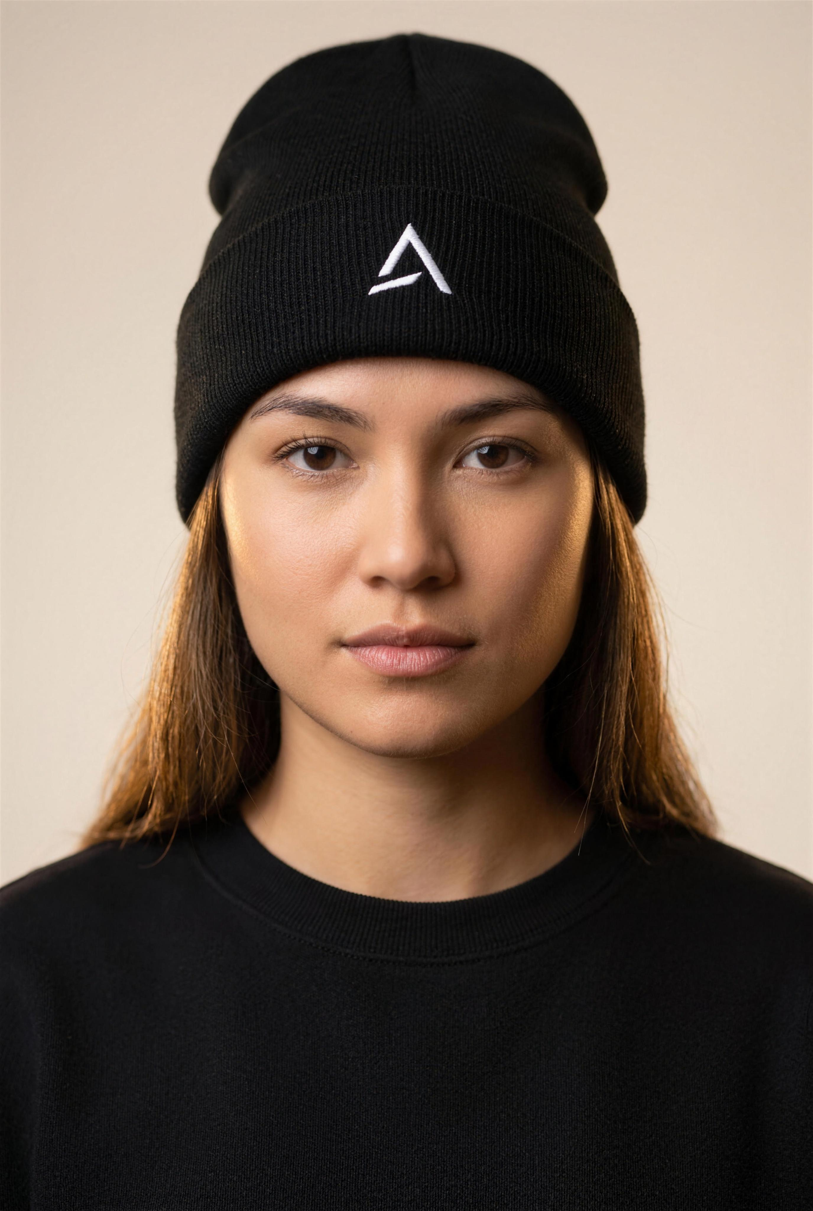 Female model wearing the Self Made Club Standard Issue Beanie