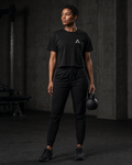 Woman modeling the black Self Made Club Form Box Tee