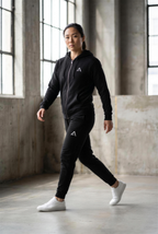 Model wearing Self Made Club Joggers
