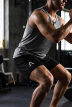 Male model wearing the Self Made Club Mesh Performance Shorts