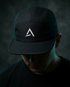Male model wearing the Self Made Club 5-Panel Camp Cap
