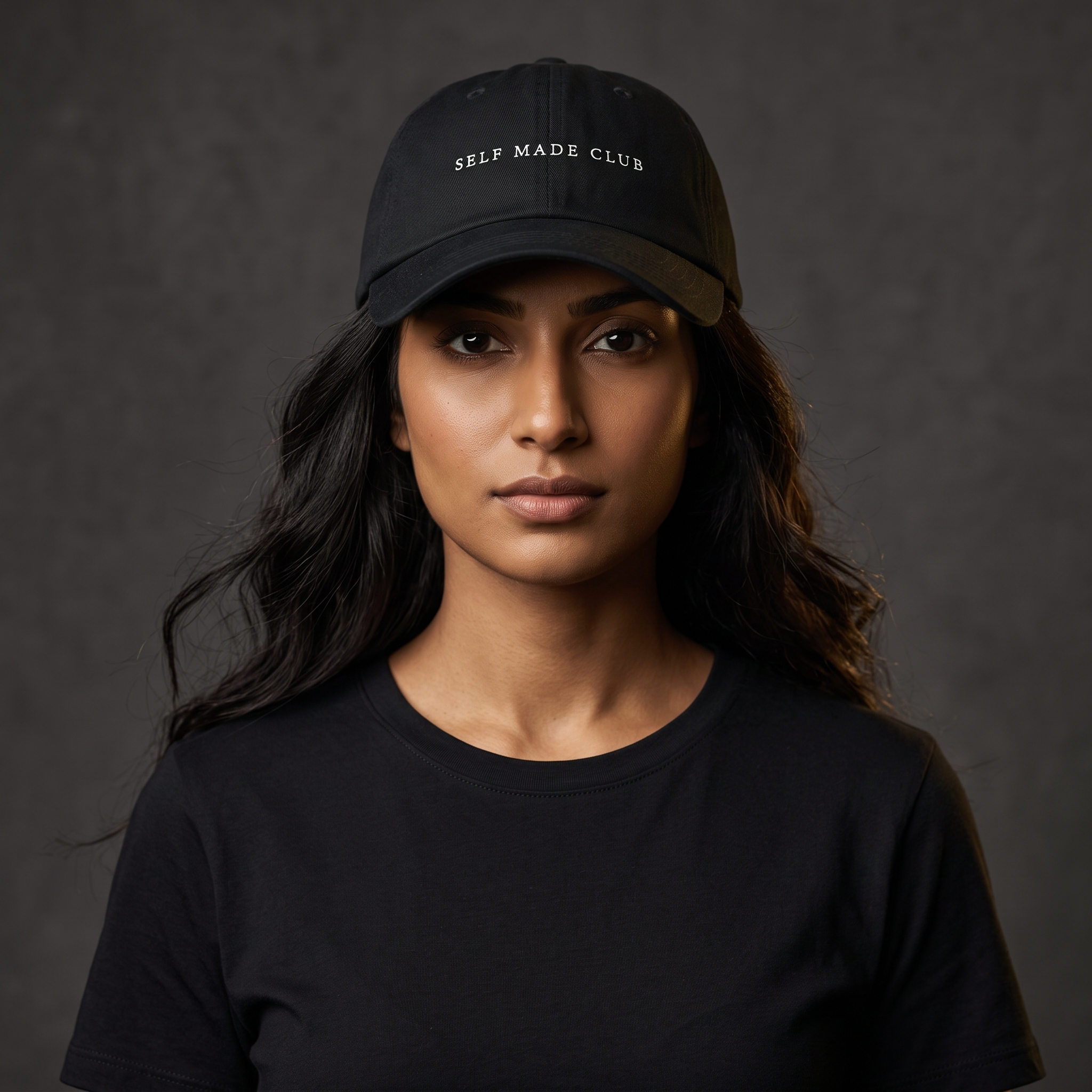 Female model wearing the Self Made Club Dad Hat