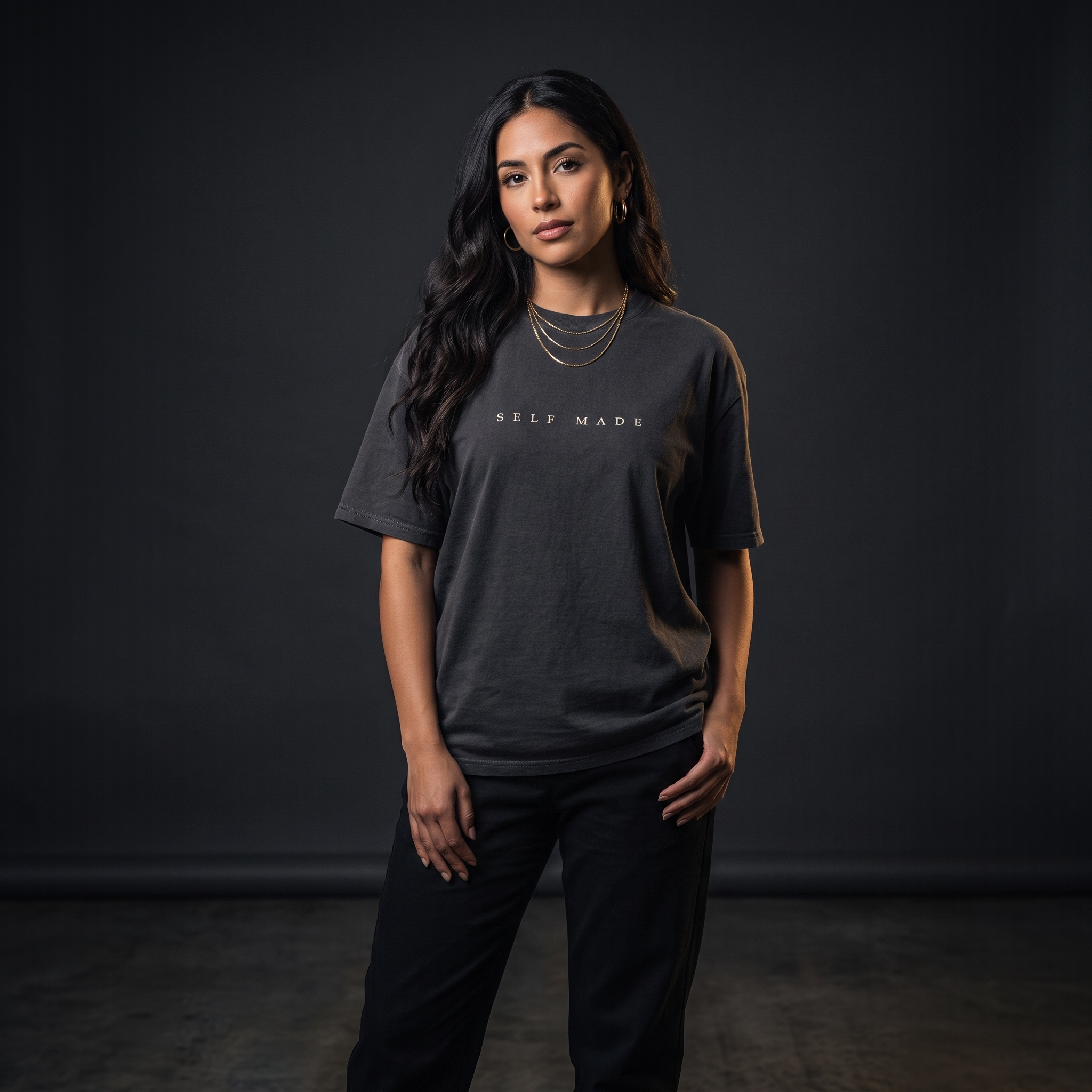 Female model wearing the Self Made Club Forged in Repetition Tee