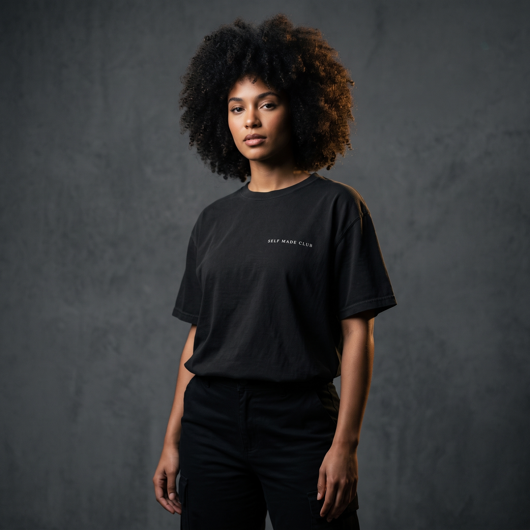 Female model wearing the Self Made Club Garment-Dyed Heavyweight Tee