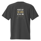 Self Made Club Forged in Repetition Tee in faded black — back view with oversized statement graphic
