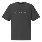 Self Made Club Forged in Repetition Tee in faded black — front view with minimal chest mark